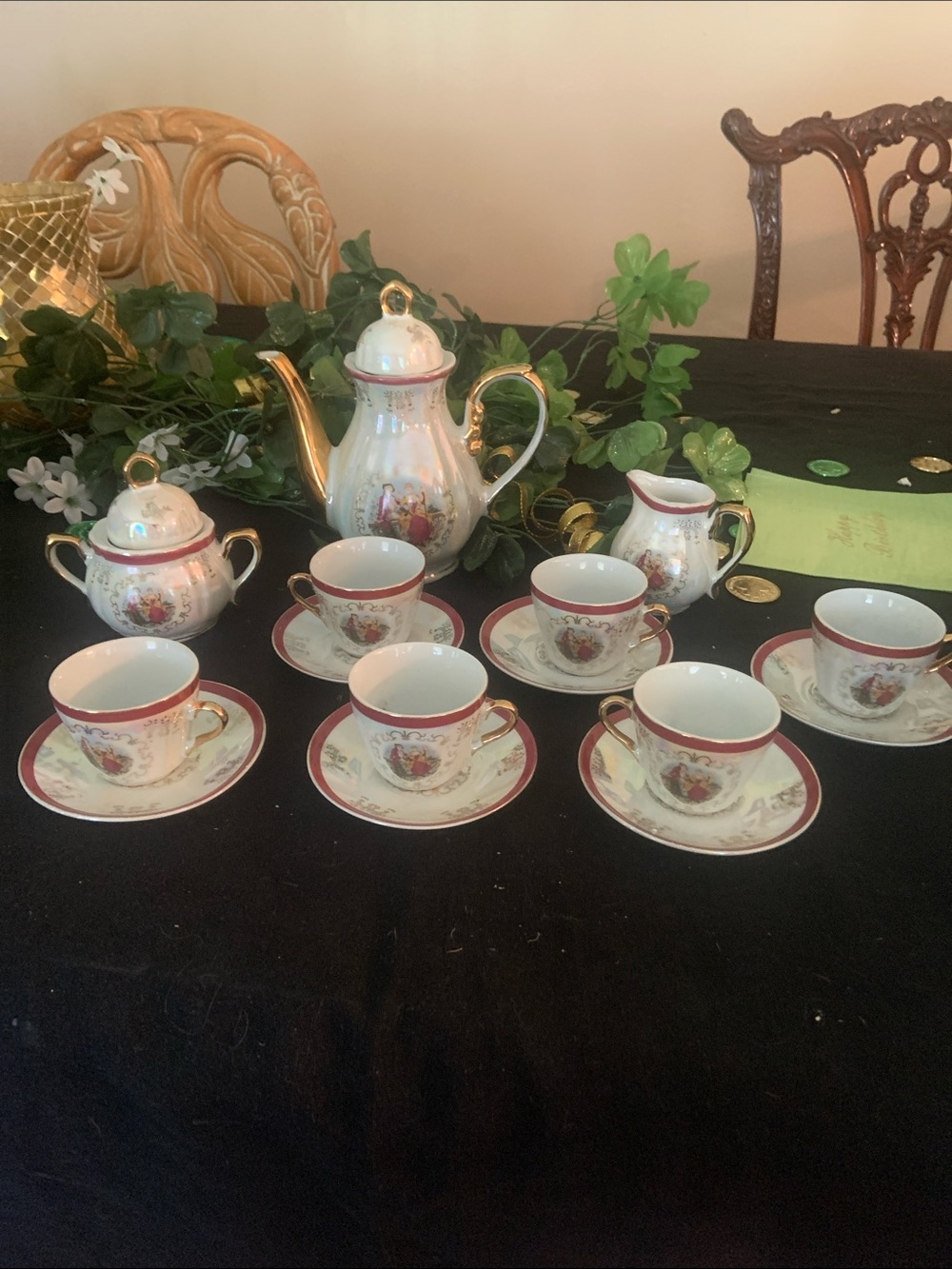 Porcelaneous Tea Set with Red Trim and Gold Accents